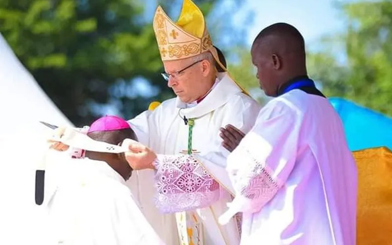 Archbishop Hubertus van Megen imposes the Pallium on Archbishop Maurice Muhatia Makumba of the Archdiocese of Kisumu in Kenya. Credit: Courtesy Photo