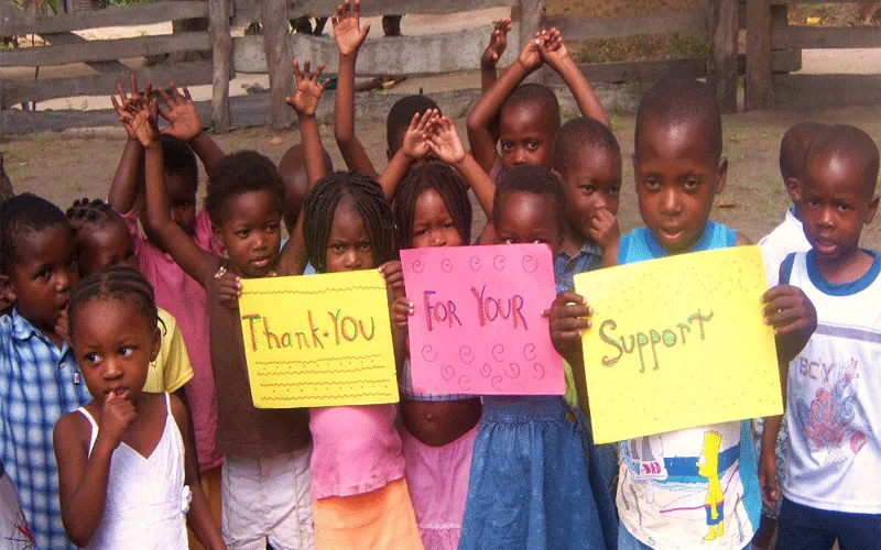 Thankful Mozambican children expressing gratitude to the international community for support after Cyclone Idai