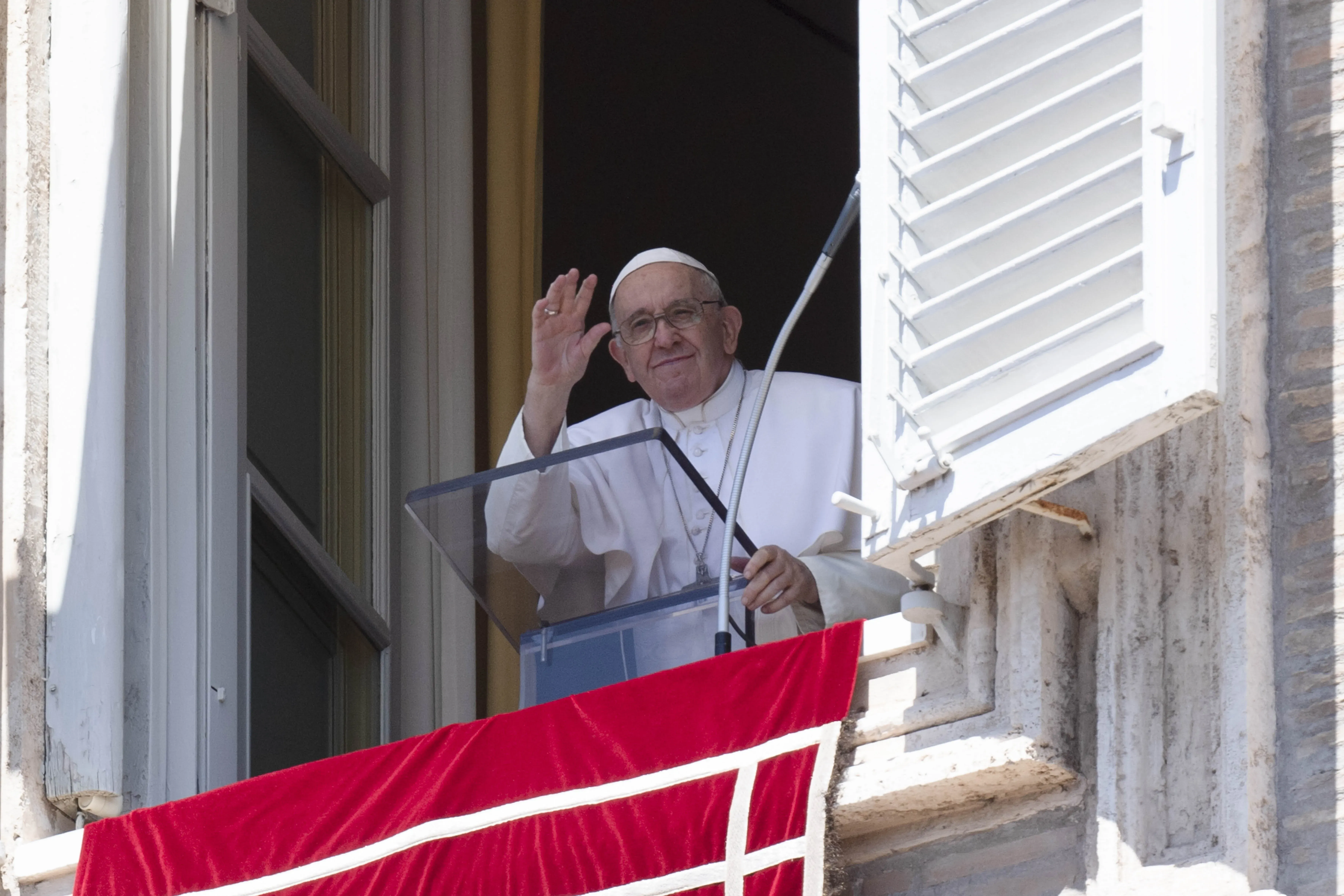 Pope Francis waves to pilgrims during the Angelus Aug. 14, 2022. Vatican Media