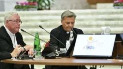 Cardinal Jean-Claude Hollerich (left), relator general of the Synod on Synodality, and Cardinal Mario Grech, secretary general of the Synod, at the Oct. 9, 2023, general congregation. | Credit: Vatican Media