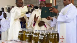 Bishop John Oballa Owaa blesses the Holy Oils during the anticipated Chrism Mass Tuesday 4 April 2023. Credit: Ngong Diocese