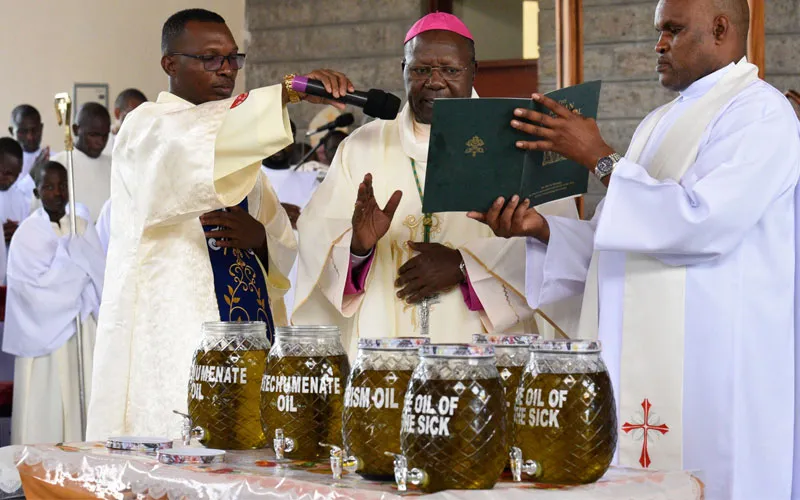 Bishop John Oballa Owaa blesses the Holy Oils during the anticipated Chrism Mass Tuesday 4 April 2023. Credit: Ngong Diocese