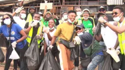 Members of Catholic Youth Organisation of Nigeria (CYON)  of the Catholic Archdiocese of Abuja during the sensitization campaign against plastic pollution to mitigate climate change. Credit: ACI Africa