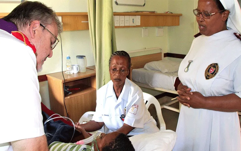 Fr. Gérard Lagleder and some of his staff in an Order of Malta clinic in Mandeni, South Africa. / Vatican News