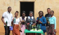 Sr. Teresa Mulenga with some community members displaying locally made soap. Credit: Sr. Teresa Mulenga
