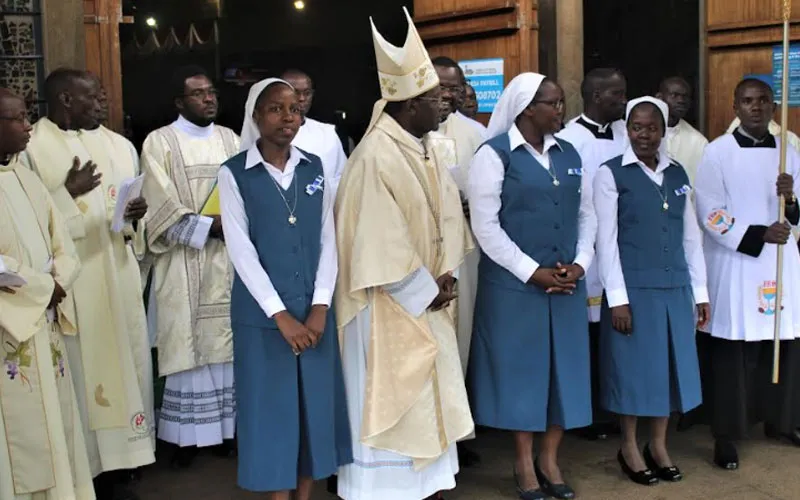 Archbishop Kivuva with three FSP members after taking perpetual vows outside Consolata Shrine. Credit: ACI Africa