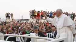 Pope Francis waves to World Youth Day pilgrims in Lisbon, Portugal, at the start of a vigil service on Aug. 5, 2023. | Vatican Media