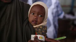 A baby's arm is measured for malnutrition at Bosley Health Centre, in Somalia. Credit: Joy Obuya/Trócaire.