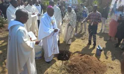 Archbishop Buti Tlhagale planting a tree at the opening of the season of creation. Credit: SACBC