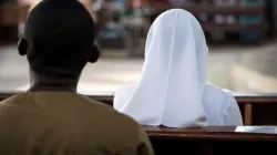 Catholics attend Mass in Ho, Ghana. James Dalrymple via Shutterstock.