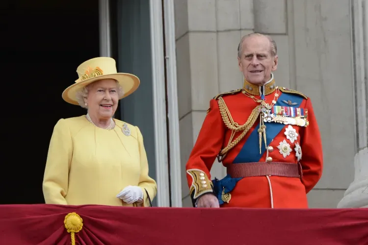 Queen Elizabeth II and the Duke of Edinburgh attend the Trooping of the Colour in London, England, June 16, 2012./ Catchlight Media/Featureflash via Shutterstock.