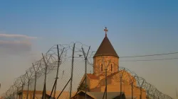 Armenian church behind barbed wire, Baghdad, Iraq. Via Shutterstock.