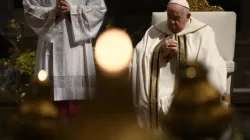Pope Francis prays during Christmas Mass in St. Peter's Basilica on Dec. 24, 2023. | Vatican Media
