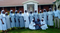 Javis Mugagga, founder of St. Kizito Leadership Institute poses with Missionary Sisters of Mary, Mother of the Church in the Catholic Diocese of Kampala, Uganda./ Credit: Javis Mugagga/ St. Kizito Leadership Institute