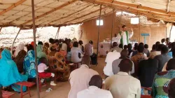 A priest celebrates Mass in Sudan before the outset of war. / Credit: ACN