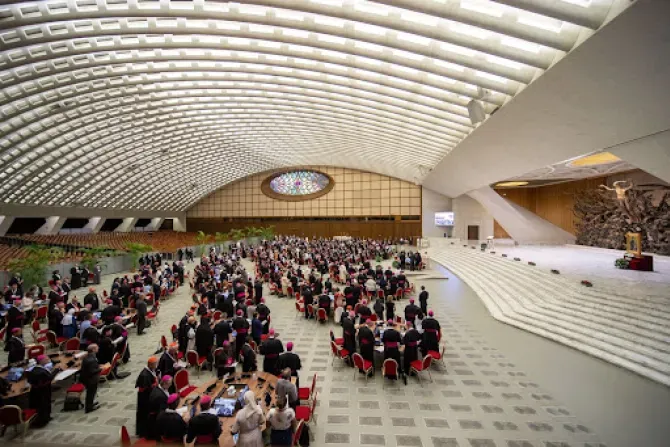 Synod on Synodality delegates seated at discussion tables inside Paul VI Hall at the Vatican in October 2023. | Credit: Daniel Ibáñez | CNA