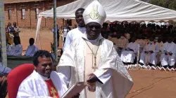 Archbishop George Desmond Tambala installs the new Parish Priest of St. Francis de Sales-Manyani Parish of Lilongwe Archdiocese. Credit: ECM