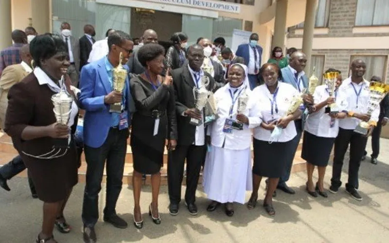 Officials of the Teachers Service Commission (TSC) and some of the awardees. Credit: Courtesy Photo