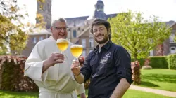 Abbey brewer Fr. Karel Stautemas and master brewer Marc-Antoine Sochon toast the opening of Grimbergen Abbey Brewery in Belgium./ PRNewsfoto/Grimbergen.