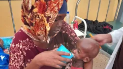 Mother of two, Fatuma Ganun Mohamed, cradles her infant son Abdikan who was recently admitted to a Trócaire supported stabilisaiton centre suffering from severe malnutrition. Credit: Trócaire