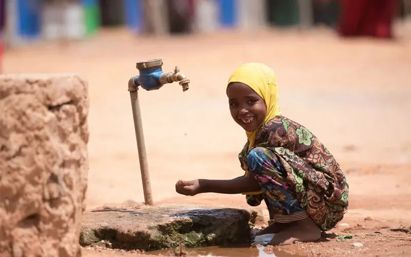 A child drinking tap water at the distribution base in kabasa Somalia. Credit: Trócaire