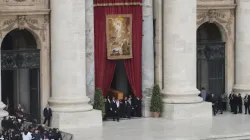 Benedict XVI’s coffin exits St. Peter’s Basilica beneath an image of Christ’s resurrection on the morning of his funeral Jan. 5, 2022 | Evandro Inetti/CNA