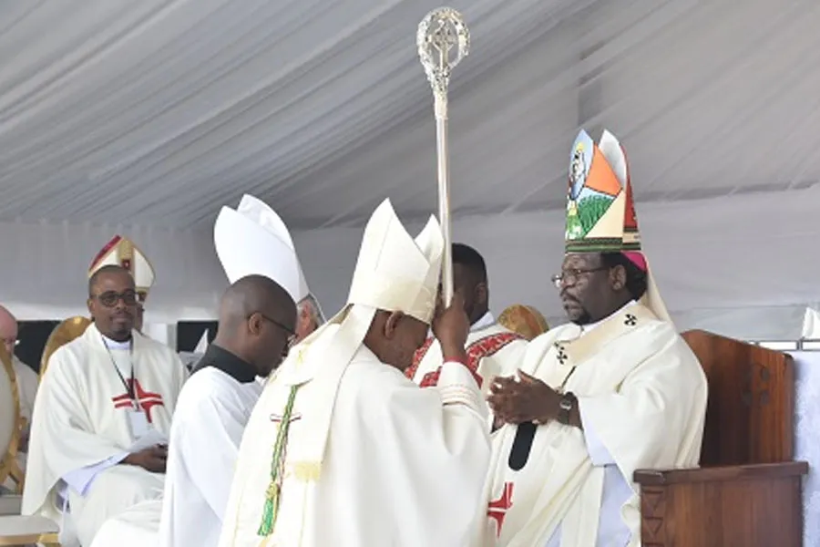Archbishop Siegfried Mandla Jwara hands the crosier to Bishop Elias Kwenzakufani Zondi during the May 27 Episcopal Ordination. Credit: SACBC