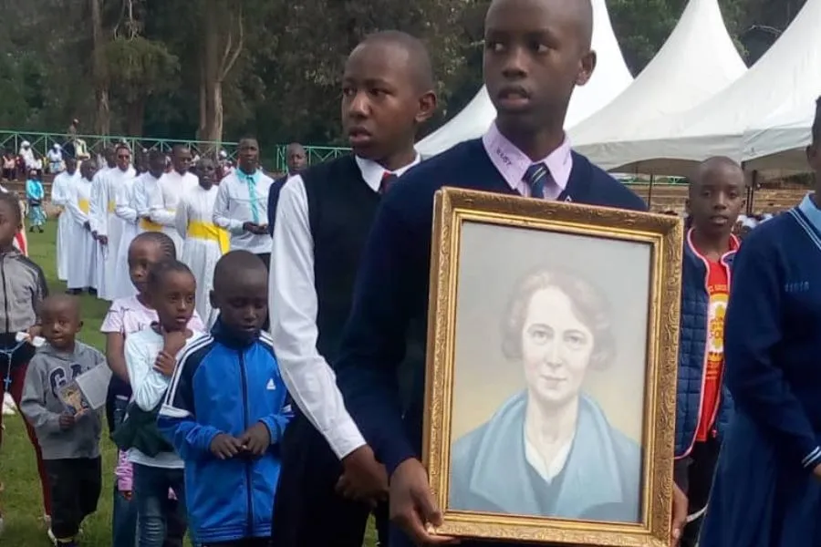 Students in process with the photo of Venerable Edel Quinn during the May 13 event at St. Mary’s Msongari School grounds in Nairobi, Kenya. Credit: ACI Africa