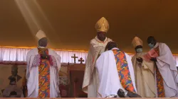 Bishops in South Sudan lay hands on Bishop Matthew Remijio Adam Gbitiku of Wau Diocese during his Episcopal Ordination Sunday, January 24. / ACI Africa