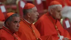 Cardinal Angelo Becciu (left) at the consistory in St. Peter's Basilica, Aug. 27, 2022. | Daniel Ibáñez / CNA