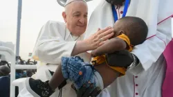 Pope Francis greets a young boy a Mass in Juba, South Sudan on Feb. 5, 2023. | Vatican Media