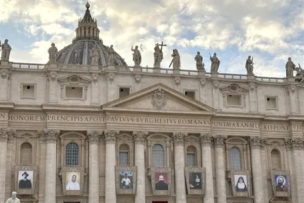 Pope Leo XIV will canonize seven new saints on Sunday including an Italian lawyer who renounced Satanism and became “an apostle of the Rosary,” a martyred Armenian archbishop, and a Venezuelan considered the “doctor of the poor.” Banners of the new saints are on display on St. Peter's Basilica for all to see in St. Peter's Square. / Credit: Courtney Mares / CNA