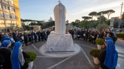 Religious sisters and dozens of faithful gather around the statue of St. John Paul II at Gemelli hospital to pray the rosary for Pope Francis on Saturday afternoon, Feb. 22, 2025 | Credit: Daniel Ibáñez/CNA