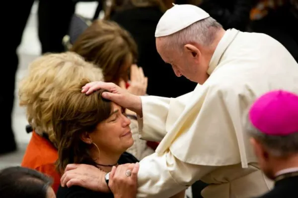 Pope Francis blesses a woman at a general audience in Paul VI Hall Dec. 5, 2018. Credit: Daniel Ibanez/CNA.