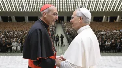 Pope Leo XIV shakes hands with Cardinal Baldassare Reina, vicar general of Rome, during a meeting with priests of the Rome Diocese at the Vatican on June 12, 2025. | Credit: Vatican Media