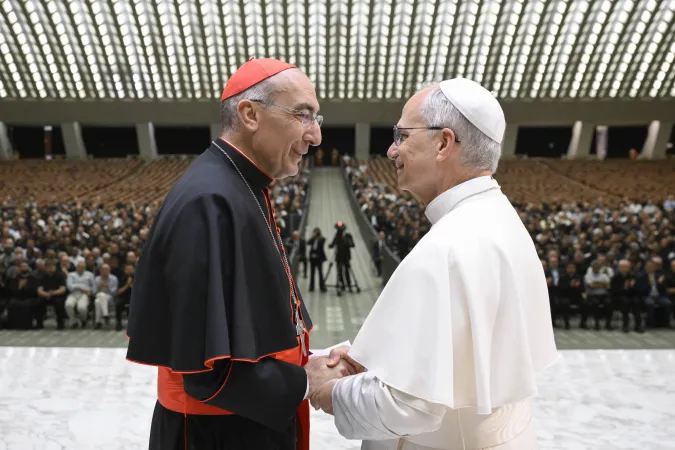 Pope Leo XIV shakes hands with Cardinal Baldassare Reina, vicar general of Rome, during a meeting with priests of the Rome Diocese at the Vatican on June 12, 2025. | Credit: Vatican Media