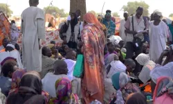 Displaced Sudanese gather and sit in makeshift tents after fleeing Al-Fashir city in Darfur. Credit: Vatican Media