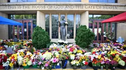 Flowers are seen on Sept. 3, 2025, outside the Annunciation Catholic Church in Minneapolis, where a shooter killed two children and injured 21 other people on Aug. 27, 2025. / Credit: Alex Wroblewski/Getty
