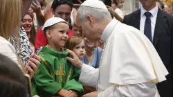Pope Leo XIV greets a young papal admirer in St. Peter’s Basilica during the general audience on Wednesday, Aug. 20, 2025, at the Vatican. / Credit: Vatican Media