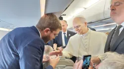 Pope Leo XIV blesses rosaries for EWTN News' Elias Turk aboard the papal plane to Ankara, Turkey, on Nov. 27, 2025. / Credit: Courtesy Elias Turk of EWTN News.