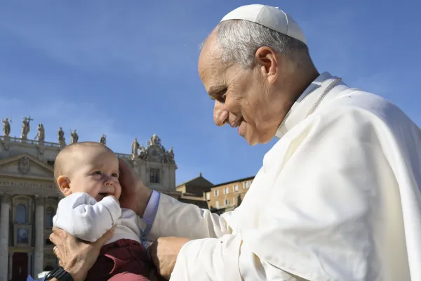 Pope Leo XIV blesses a baby on All Saints Day’ 2025. / Credit: Vatican Media