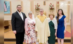 Father Travis Moger on the day of his ordination alongside his son, Mark; wife, Amelia; mother; and daughter, Maddy. | Credit: EWTN News screenshot
