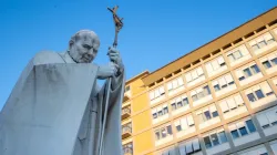 A statue of St. John Paul II stands outside Gemelli Hospital in Rome. | Credit: Daniel Ibañez/CNA