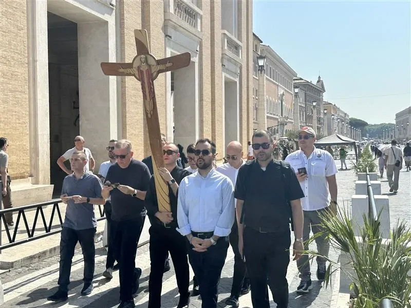 Seminarians approach the Holy Door at St. Peter’s Basilica on Tuesday, June 24, 2025. / Credit: Courtney Mares/CNA