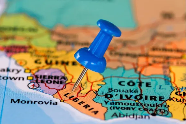 Map of Liberia with a blue pushpin stuck. Credit: Wead/Shutterstock