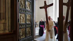 Pope Leo XIV passes through the Holy Door carrying the jubilee cross as he leads the pilgrimage of the Holy See on June 9, 2025. / Credit: Vatican Media