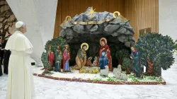 Pope Leo admires the Nativity scene that was made in Costa Rica. / Credit: Vatican Media