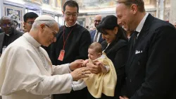 Pope Leo XIV greets a baby during an audience with the Pontifical John Paul II Institute for Studies on Marriage and the Family at the Vatican on Friday, Oct. 24, 2025. / Credit: Vatican Media