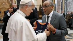 Film director Spike Lee gives Pope Leo XIV a customized New York Knicks jersey at the Vatican on November 15, 2025. / Vatican Media