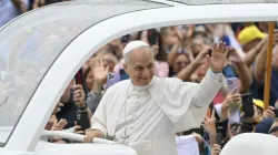 Pope Leo XIV waves at the crowds of people who braved a rainy morning for the general audience in St. Peter’s Square on Sept. 10, 2025. / Credit: Vatican Media